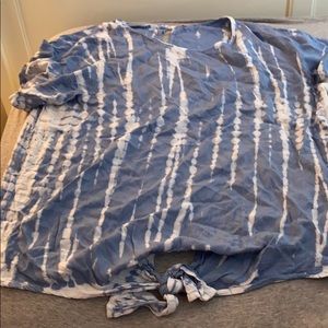 Blue and white printed shirt with tie on bottom